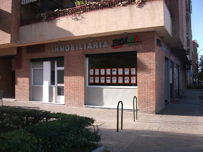 Inmobiliaria Triple A Calle Torre de Peralada 2 Bajo local 7 18008 Granada
